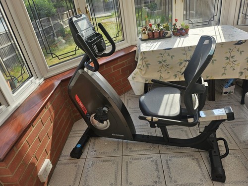 Recumbent exercise bike - , by